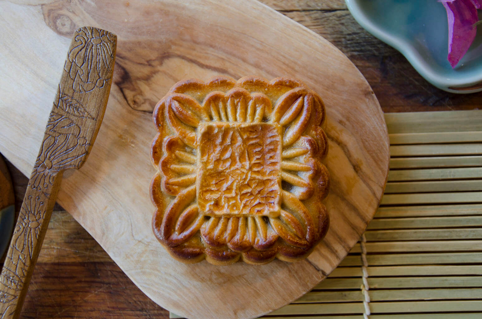 Large Lotus & Pinenut Mooncake on wooden plate