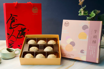 8 pcs Taro Mochi Pastry Box with Decorate purple box lid beside it and red decorative bag behind.
